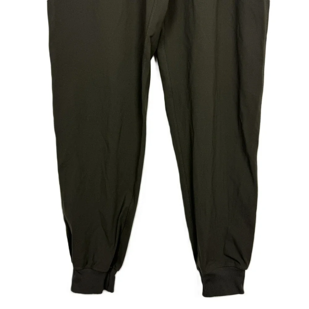 Lululemon On The Fly Jogger Dark‎ Olive Green Elastic Waist Size 8 FLAWED